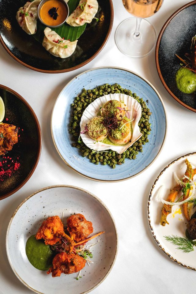 Beautifully plated modern Indian dish using fresh British produce at Indian Essence.