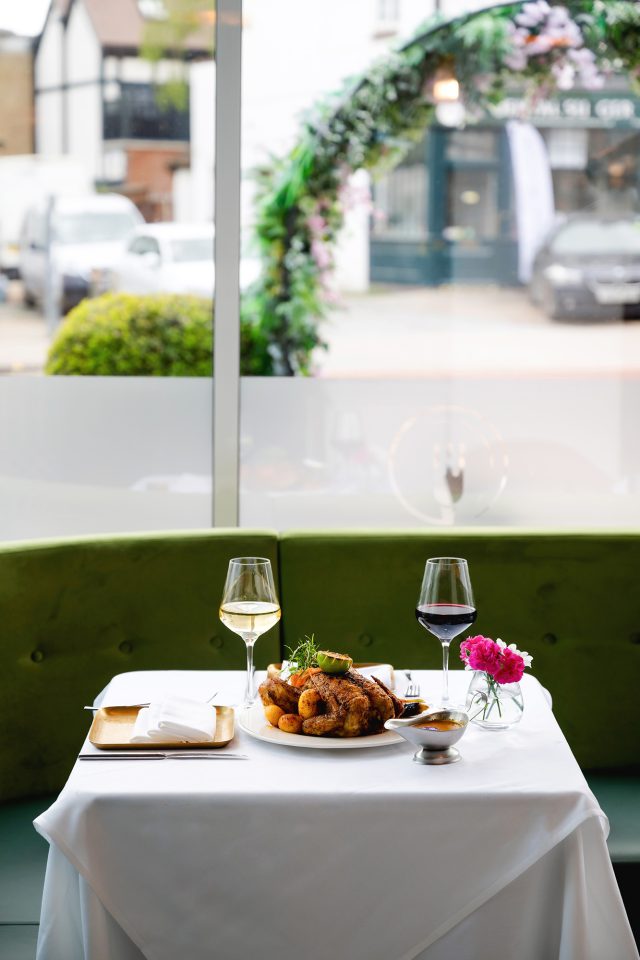 The warm and welcoming dining room at Indian Essence in Petts Wood, prepared for a Sunday lunch service.