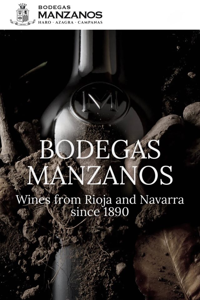 Promotional artwork for Bodegas Manzanos featuring a wine bottle resting in rich soil, highlighting their heritage of crafting wines from Rioja and Navarra since 1890.